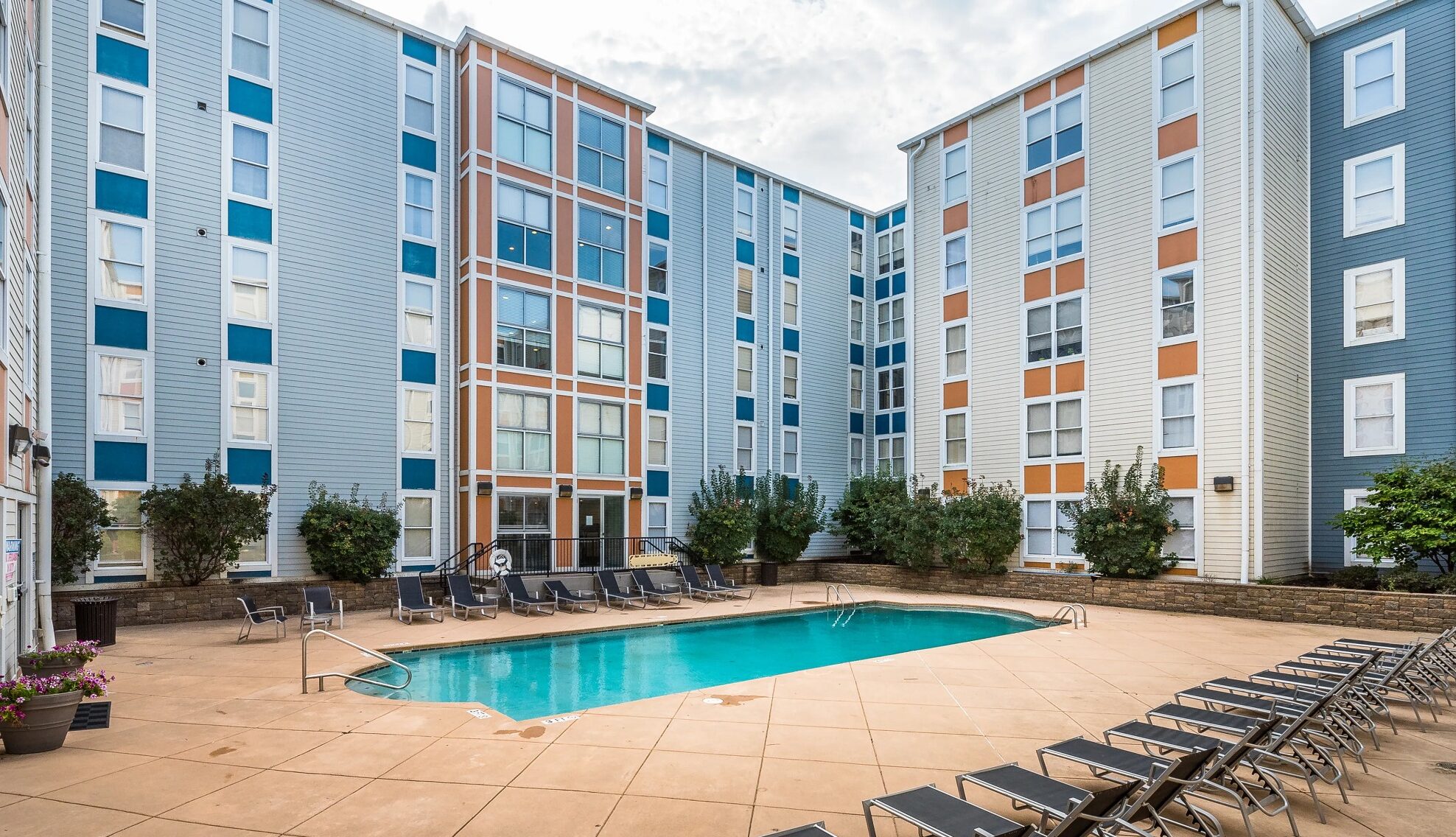 CP Cincy swimming pool and sundeck lounge chairs