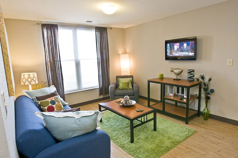 Model living room of a student apartment at CP Cincy